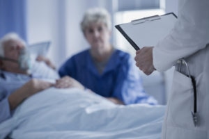 Doctor checking man at the hospital