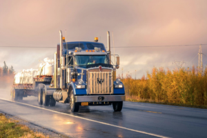 A truck driver driving within hours-of-service rules.